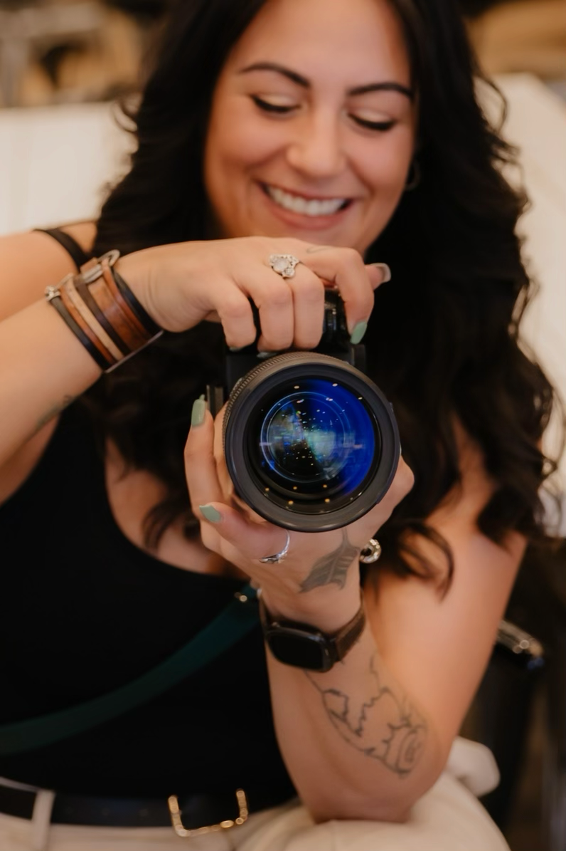 Montana taking photos during a photography shoot